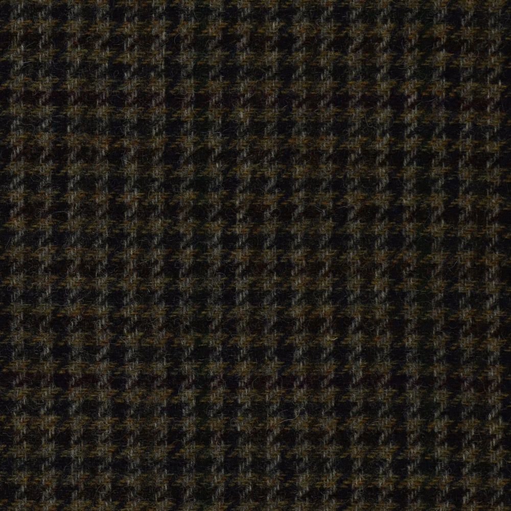 Charcoal-black woven fabric with small bronze, olive and brown textured flecks