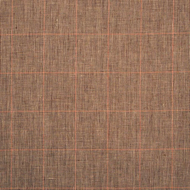 Warm brown micro-check textile with rust and pale cream threads in a tight weave
