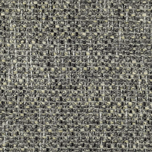 Mottled charcoal, grey, cream and olive heavily textured woven fabric surface