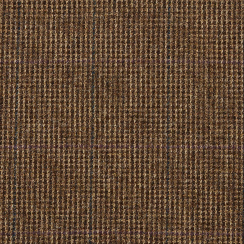 Close-up of charcoal-brown woven fabric with tan flecks and subtle plum lines