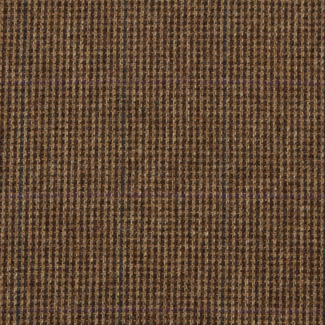 Close-up of charcoal-brown woven fabric with tan flecks and subtle plum lines