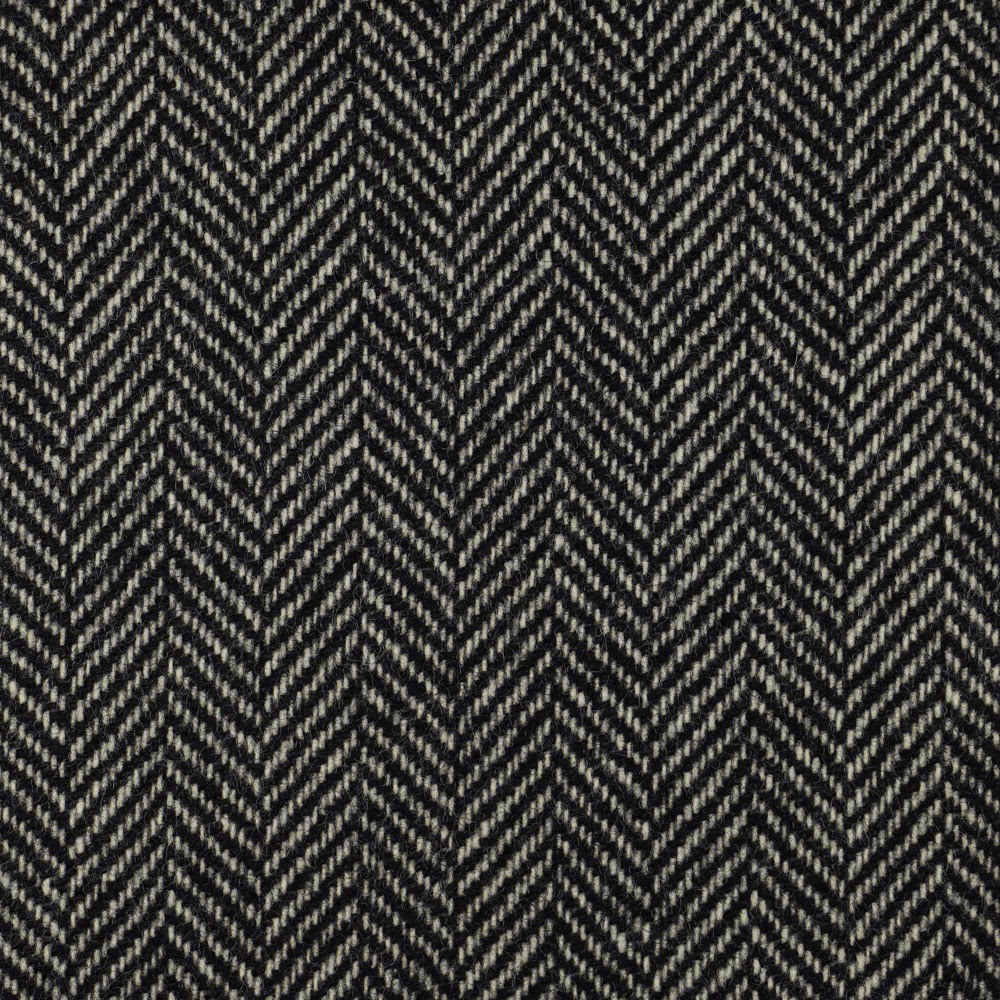 Charcoal black woven fabric with tightly spaced pale grey herringbone chevrons