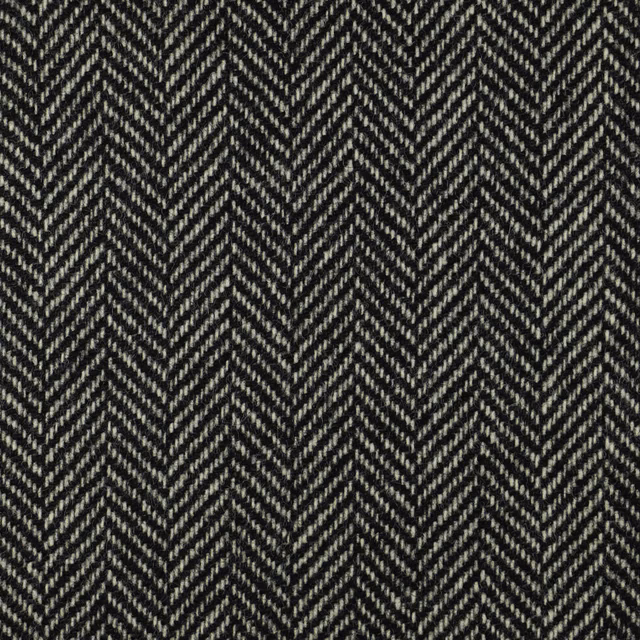 Charcoal black woven fabric with tightly spaced pale grey herringbone chevrons