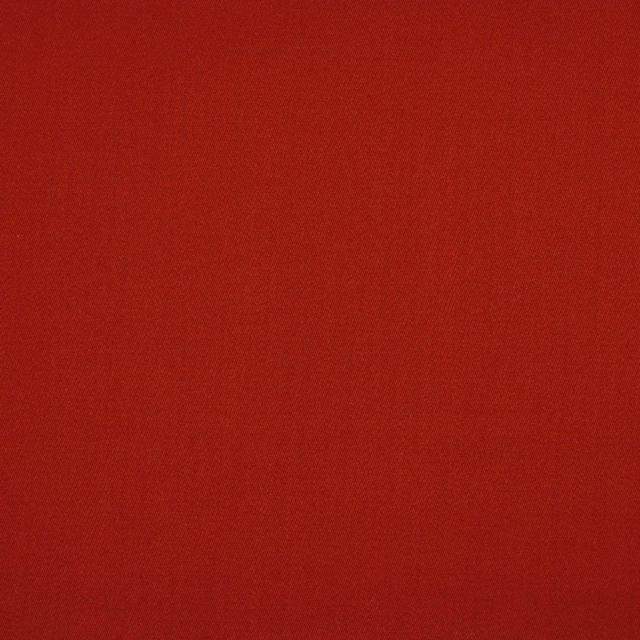 Deep crimson-red fabric swatch with a subtle plain woven texture