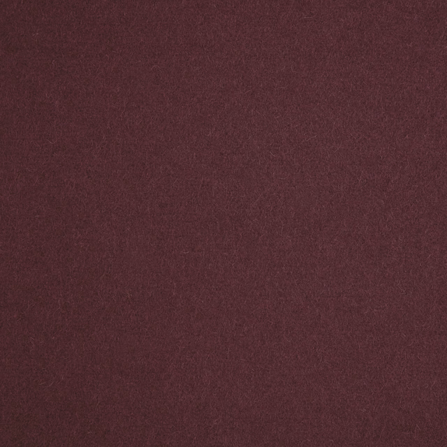 Deep wine-burgundy fabric with a soft, subtly mottled plain weave texture