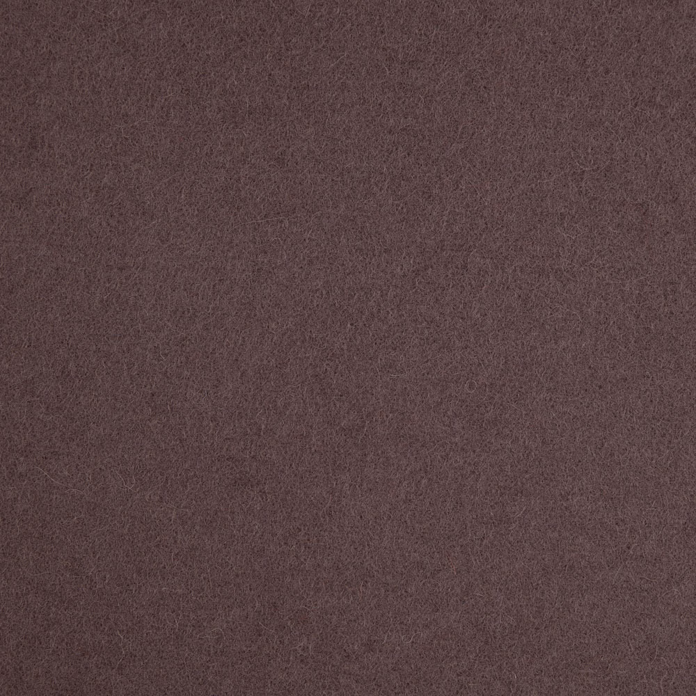 Close-up of muted plum-brown fabric with a soft, finely mottled texture