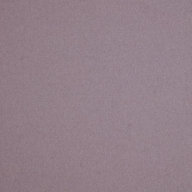 Close-up of dusty mauve-taupe fabric with a fine, softly mottled texture
