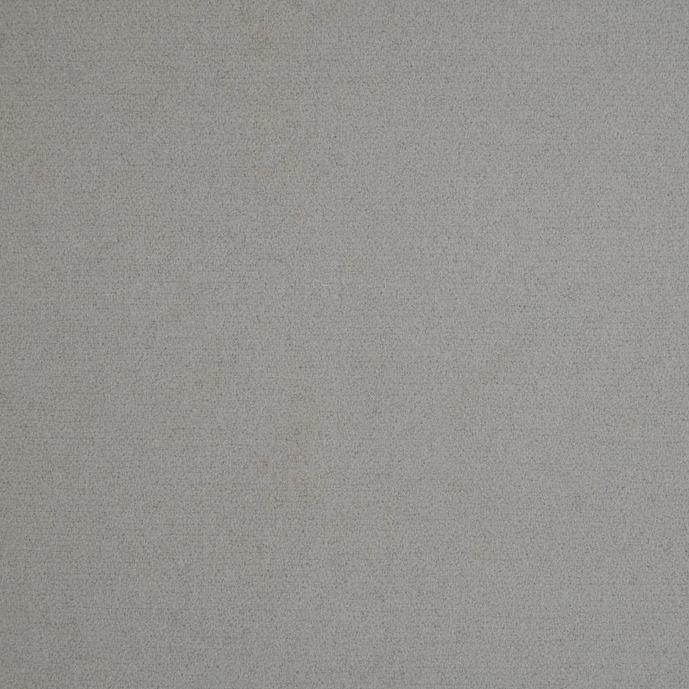 Fine-textured warm grey fabric with a softly mottled, mineral-like surface