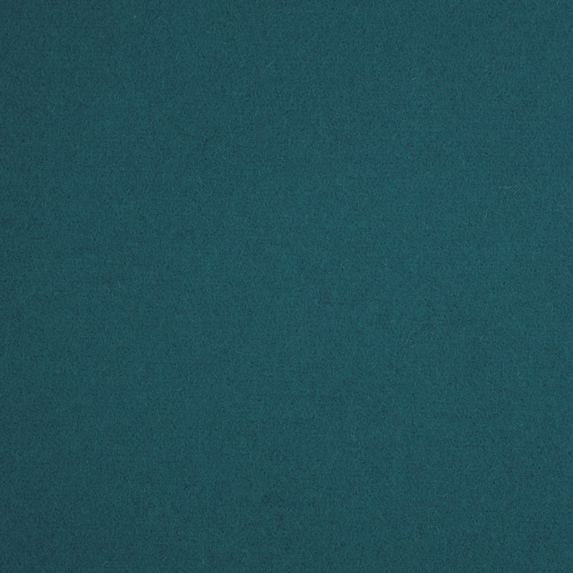 Deep blue-green teal fabric with a fine, softly mottled matte surface
