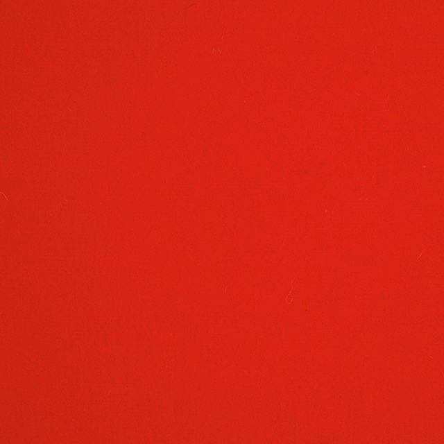 Vivid scarlet-red plain fabric with a subtly mottled smooth surface