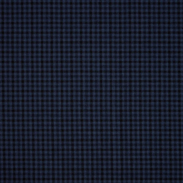 Close-up of deep navy and black small-check woven fabric with fine texture