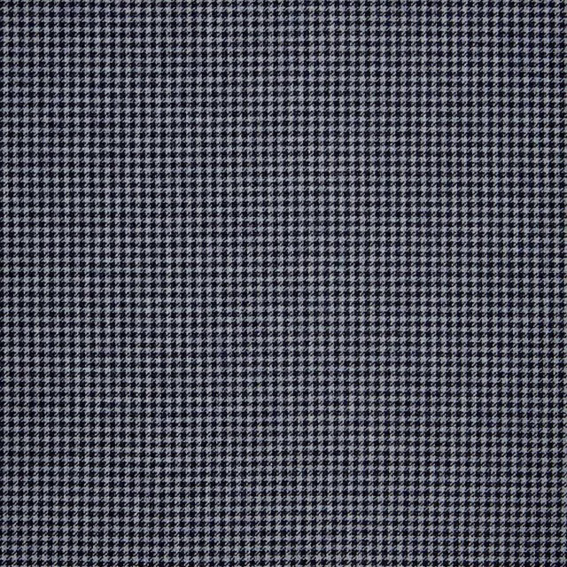 Close-up of charcoal and pale grey small houndstooth weave with crisp texture