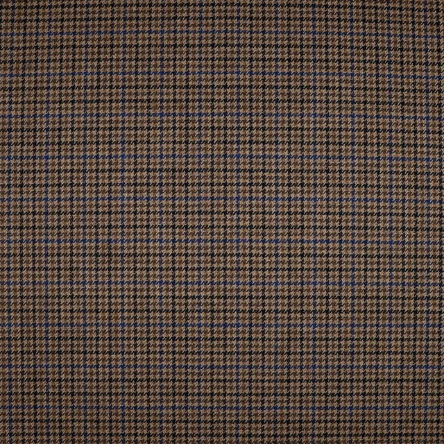 Warm brown and tan woven fabric with small deep navy houndstooth checks