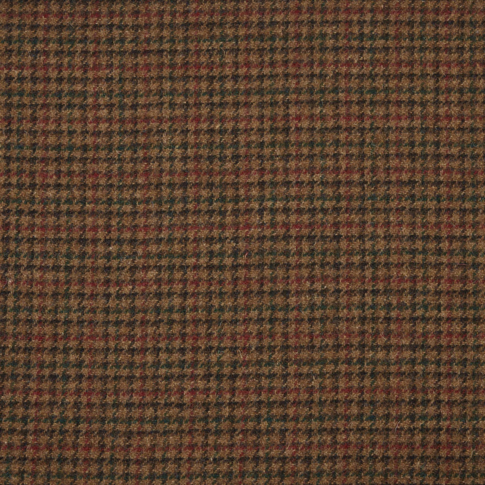 Close-up of brown woven check with muted rust, olive and charcoal flecks