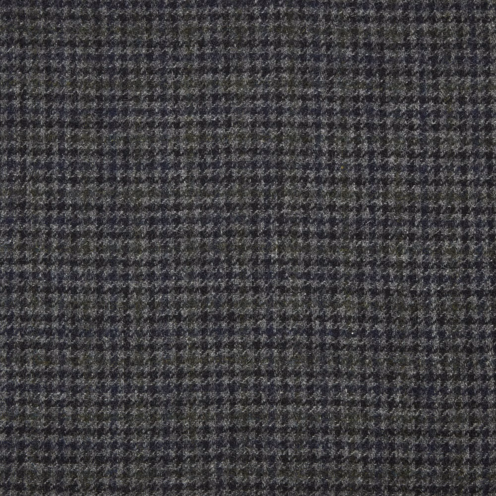 Close-up of dark charcoal-grey fabric with a fine, softly irregular check weave