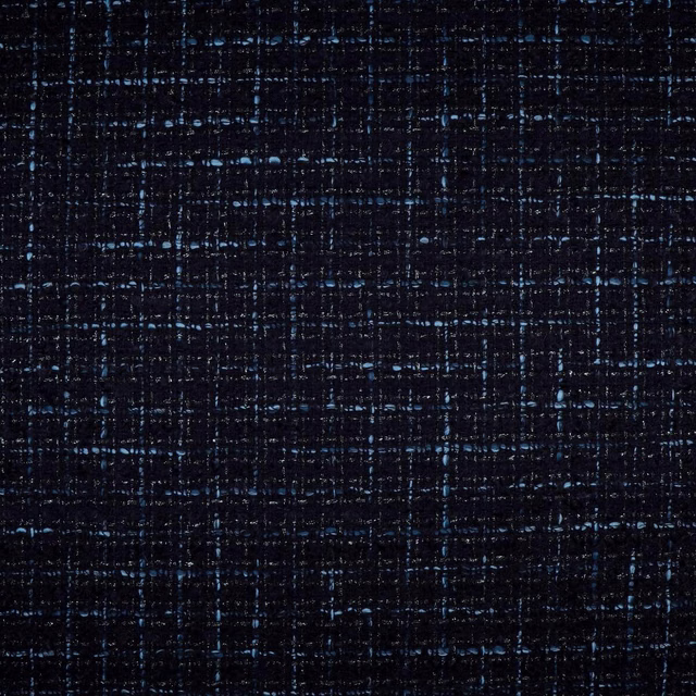 Ink navy and black woven fabric with irregular grid texture and subtle blue flecks