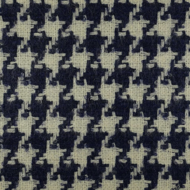 Ink navy and cream woven fabric with softly brushed broken geometric motifs