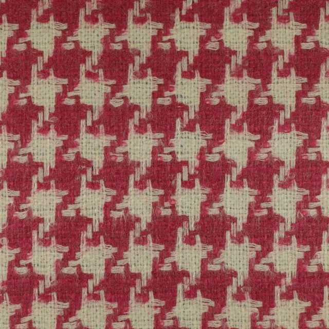 Deep crimson woven fabric with irregular ivory geometric cross-like motifs and visible texture