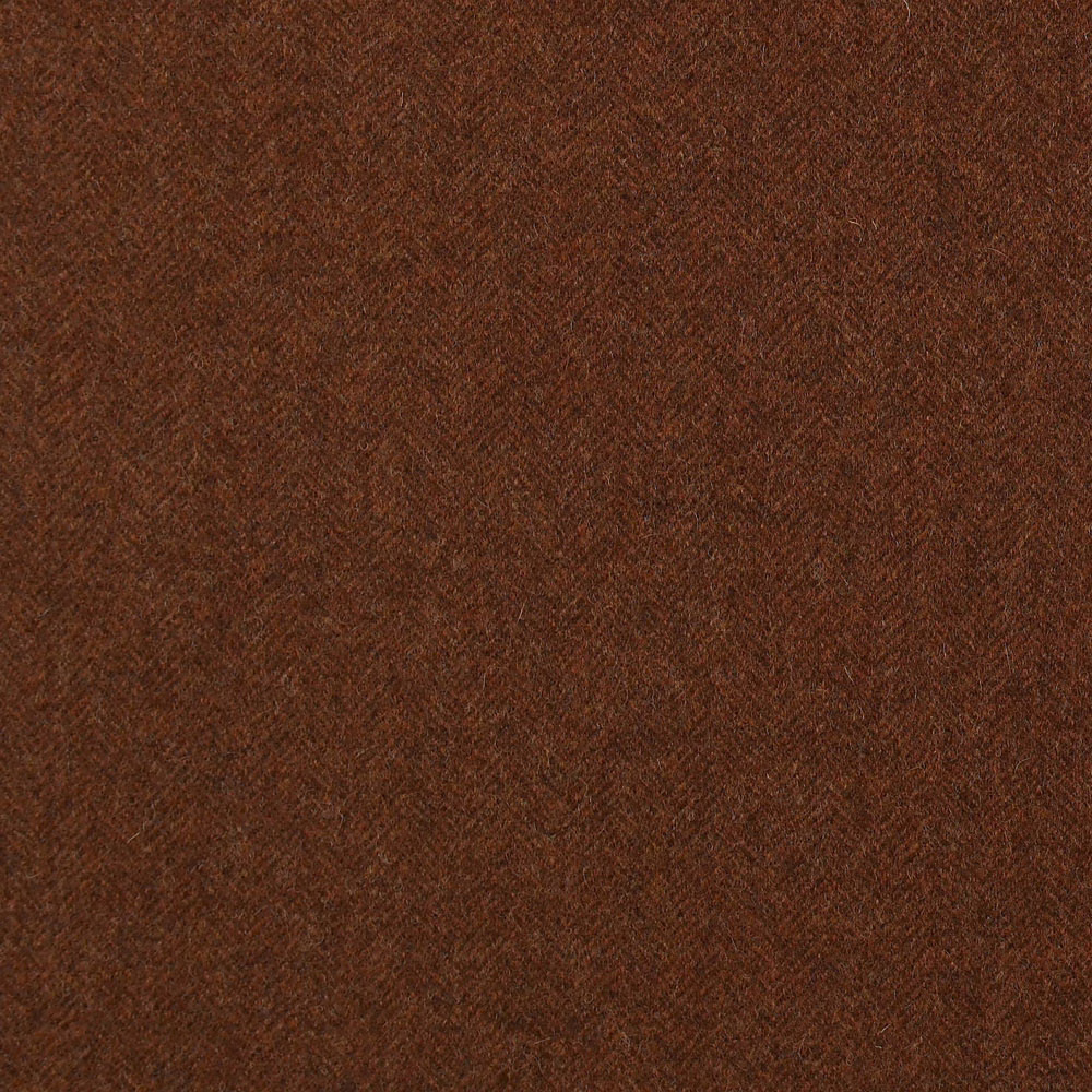 Deep burnt-orange brown cloth with a subtle close-woven herringbone texture
