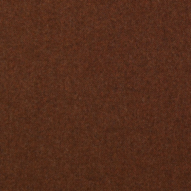 Deep burnt-orange brown cloth with a subtle close-woven herringbone texture
