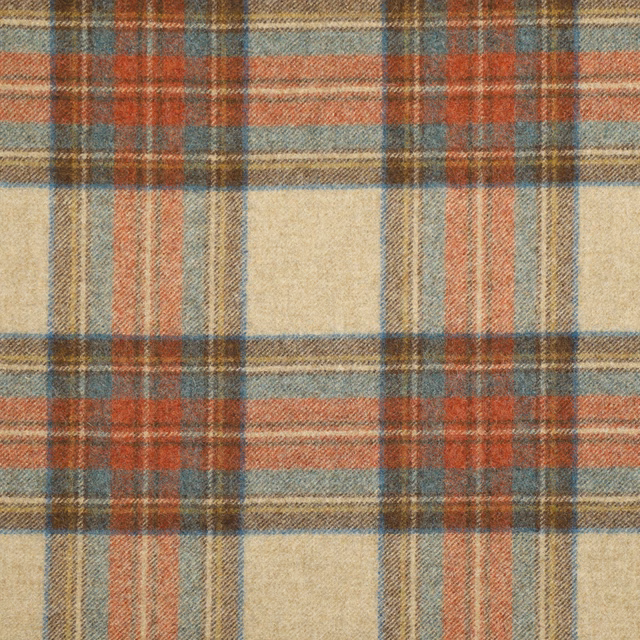 Muted oat tartan with rust, blue-grey and brown bands in a brushed weave