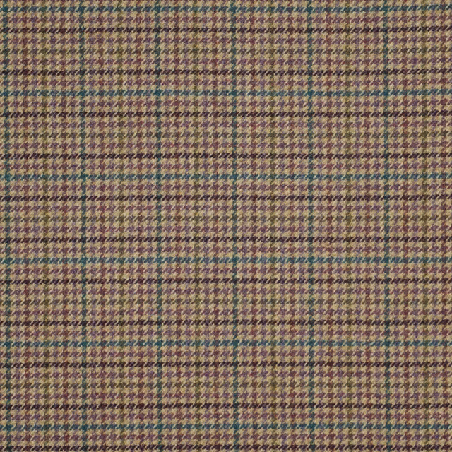 Close-up of muted lavender woven houndstooth with olive, teal and cream highlights