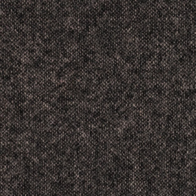 Dense charcoal weave with irregular pale grey flecks and tactile surface texture
