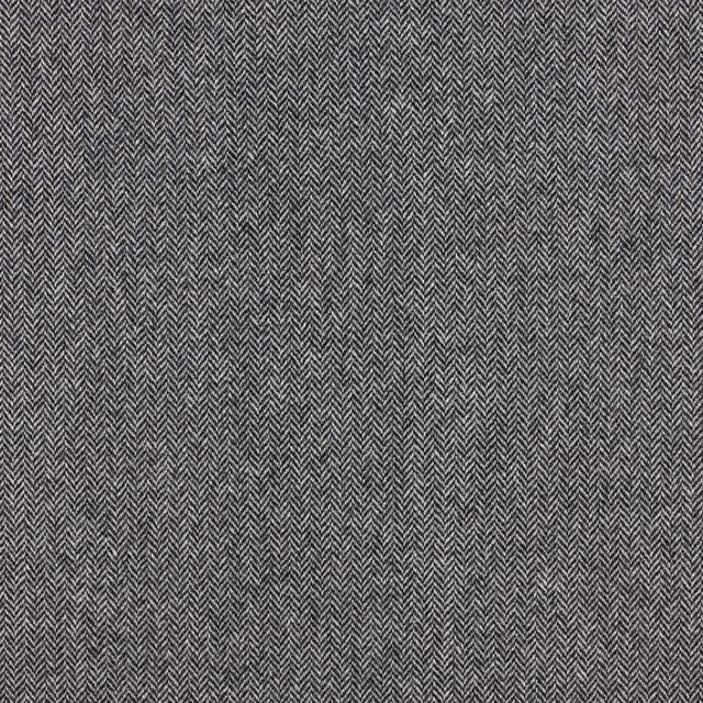 Charcoal-black and white herringbone weave with a fine, tightly textured surface