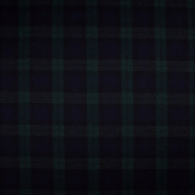 Near-black and deep forest green tartan checks with a subtly textured woven face