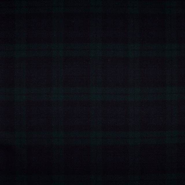 Near-black and deep forest-green woven Blackwatch plaid with subtle layered checks
