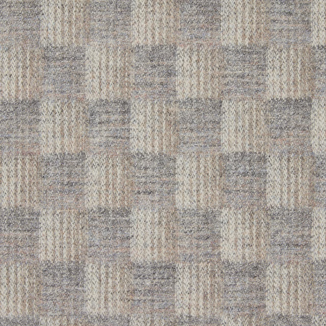Close-up of taupe, stone and grey woven rectangular patchwork with nubby texture