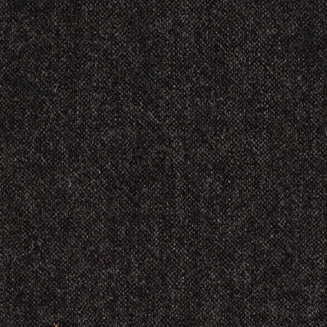 Dark charcoal-grey woven swatch with fine nubby texture and subtle tonal flecks