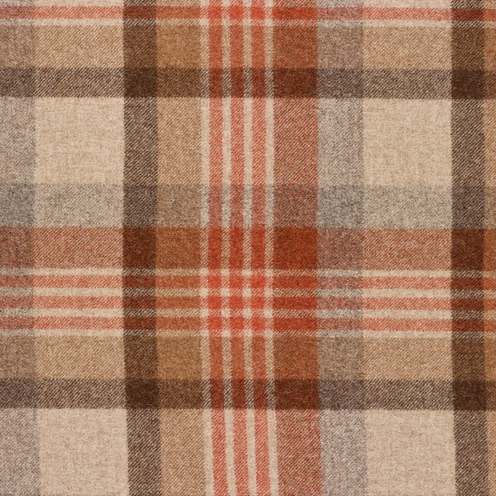 Rust-red, tan, cream and brown woven plaid with a softly nubby texture