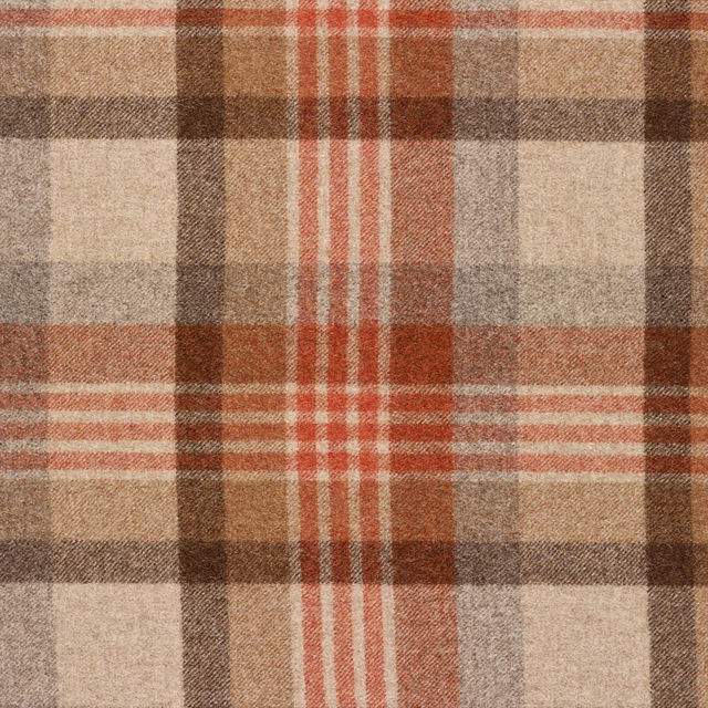 Rust-red, tan, cream and brown woven plaid with a softly nubby texture