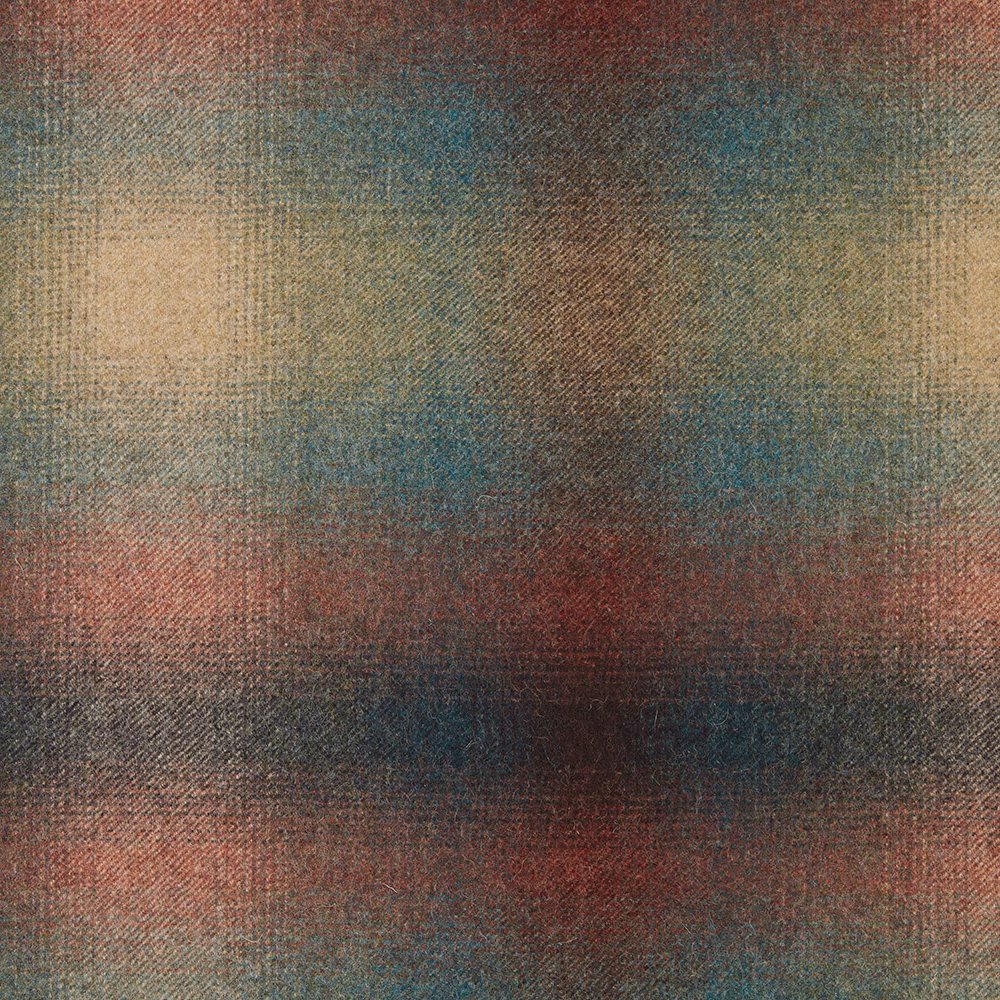 Close-up of indigo, teal, rust and charcoal bands in a nubby woven texture