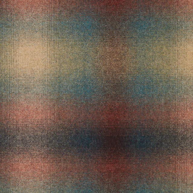 Close-up of indigo, teal, rust and charcoal bands in a nubby woven texture