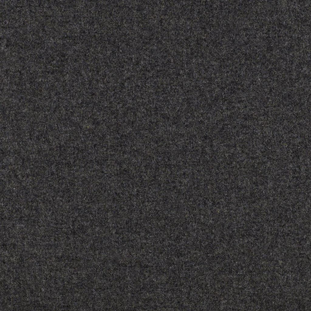 Close-up of dark charcoal grey fabric with a dense, softly mottled surface