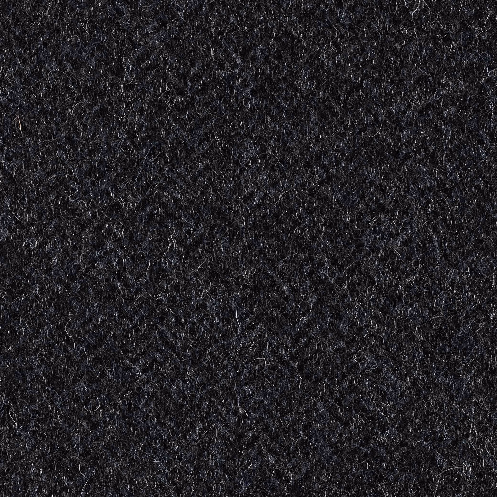 Near-black charcoal fabric with dense curly loops and blue-grey flecks