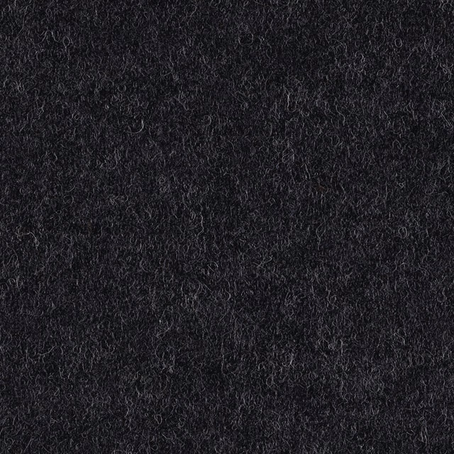 Near-black denim-blue textile with dense curly loops and a softly mottled surface