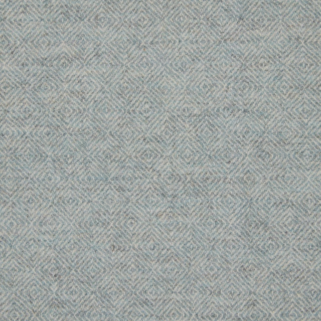 Cool slate blue-grey fabric with a subtle woven diamond and chevron pattern