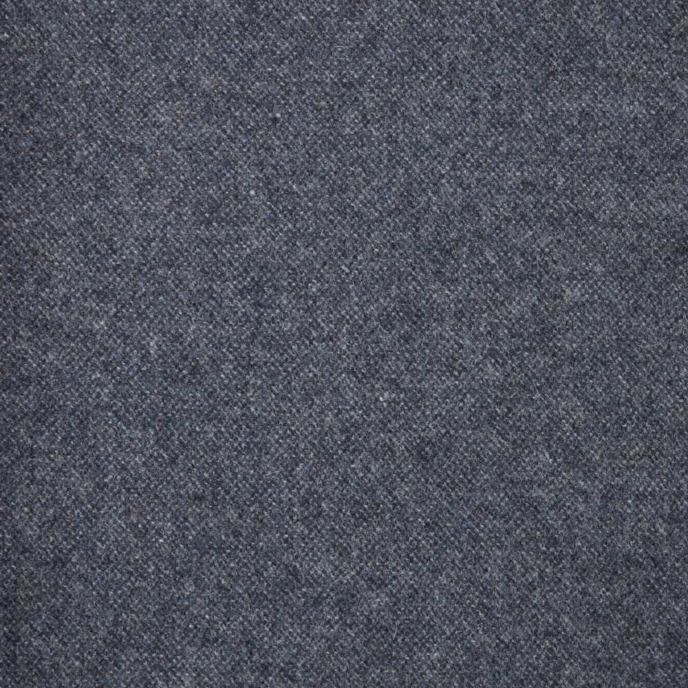 Close-up of deep airforce blue-grey fabric with fine mottled diagonal weave