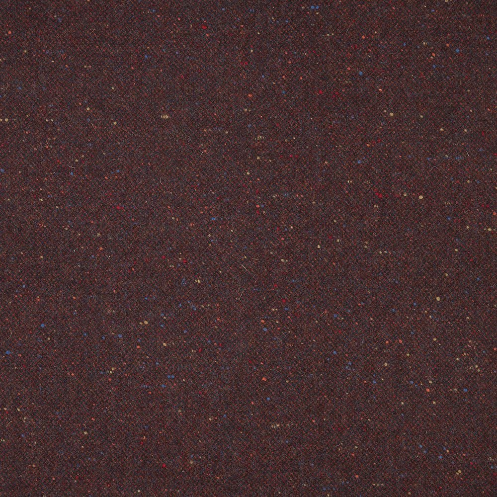 Dark burgundy woven textile with tiny red, blue and ochre flecks