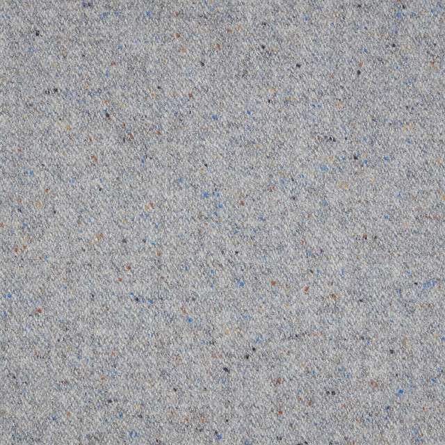 Close view of muted denim blue-grey weave with cream, tan and dark flecks