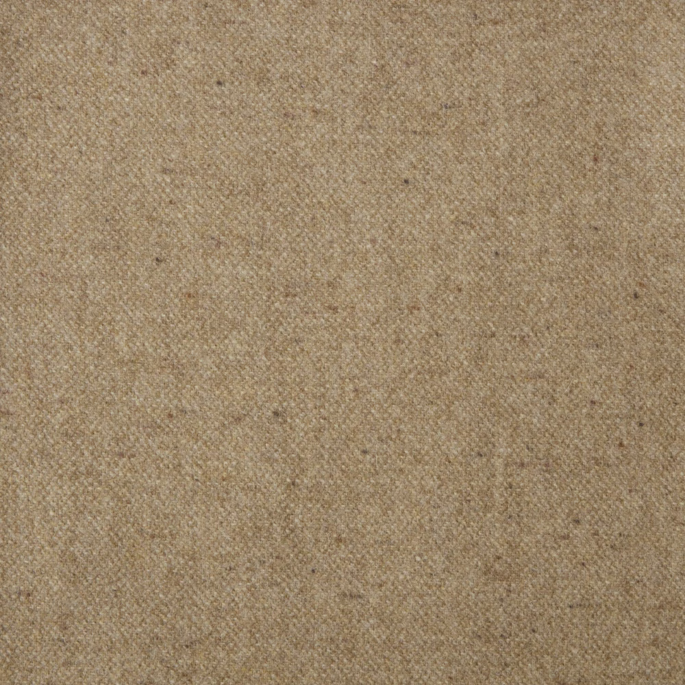 Close-up of Donegal Honey's warm honey-beige flecked weave with subtle diagonal texture
