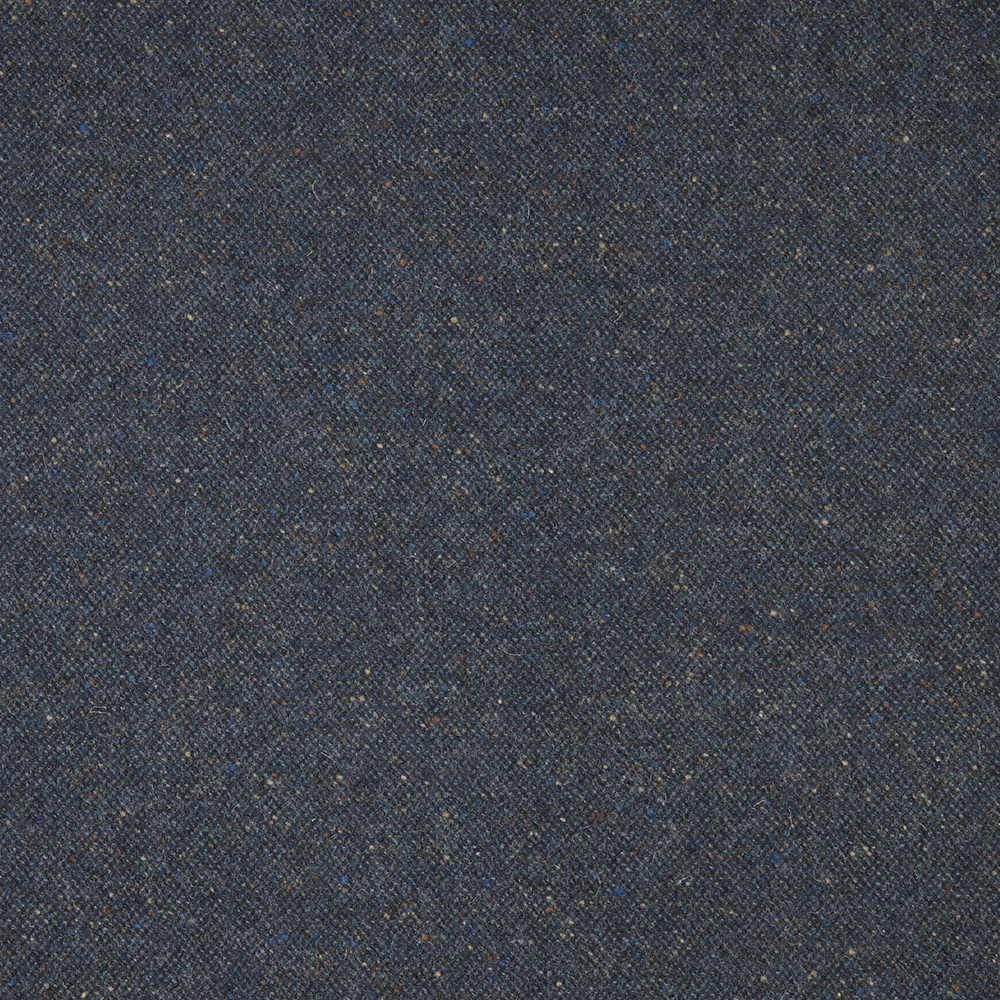 Close view of dark indigo weave with charcoal, blue and brown flecks