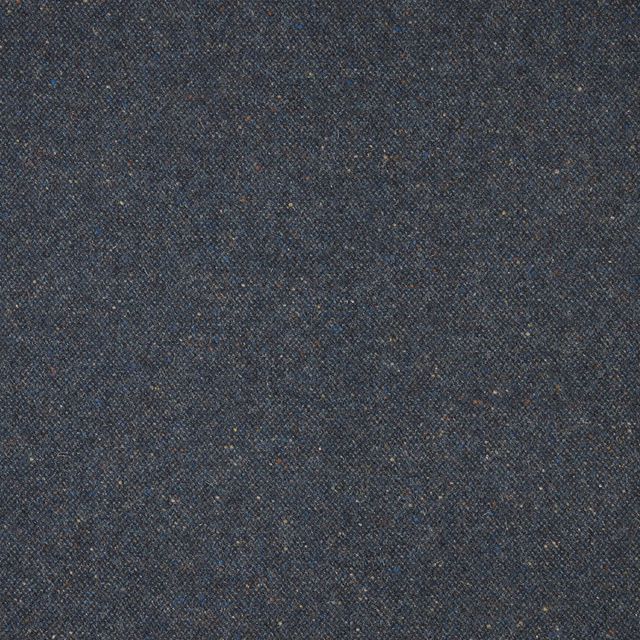 Close view of dark indigo weave with charcoal, blue and brown flecks