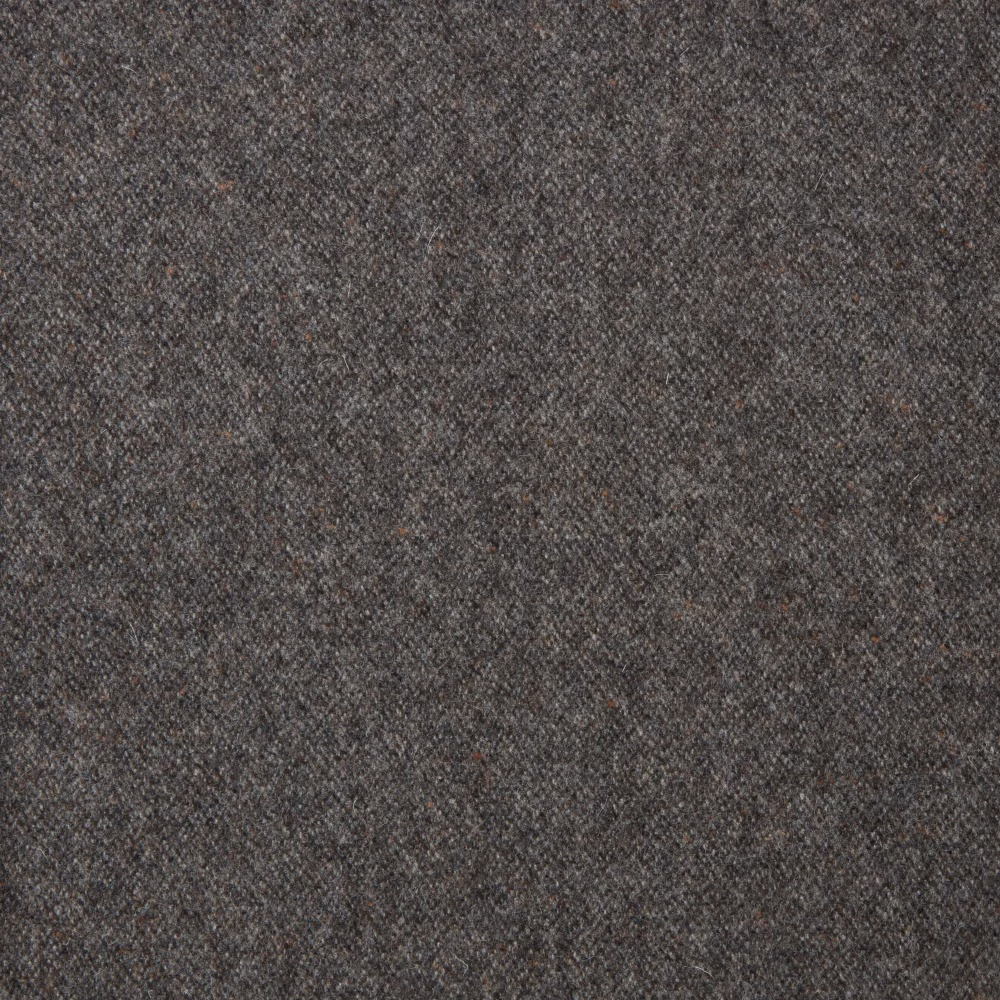 Dark taupe-grey Donegal fabric with a finely mottled woven texture