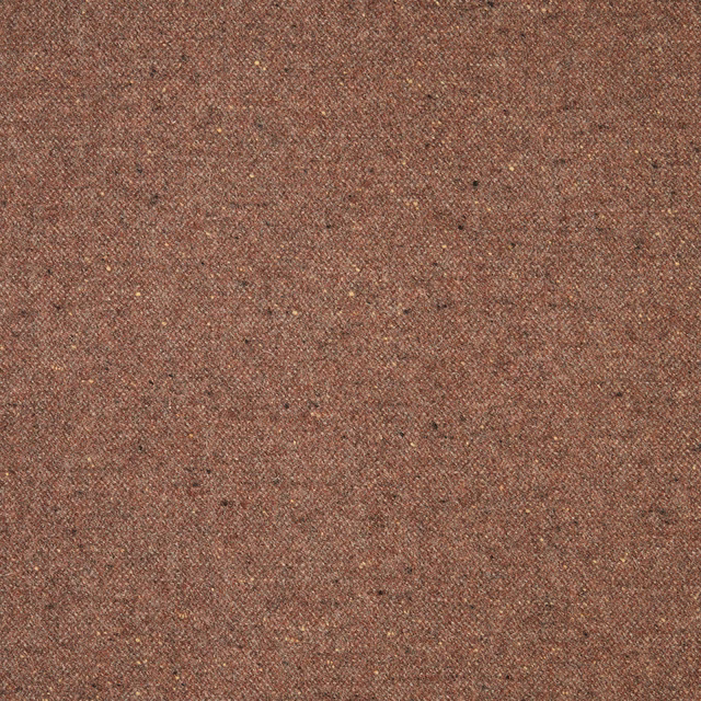 Close-up of muted terracotta-brown woven fabric with fine dark flecks
