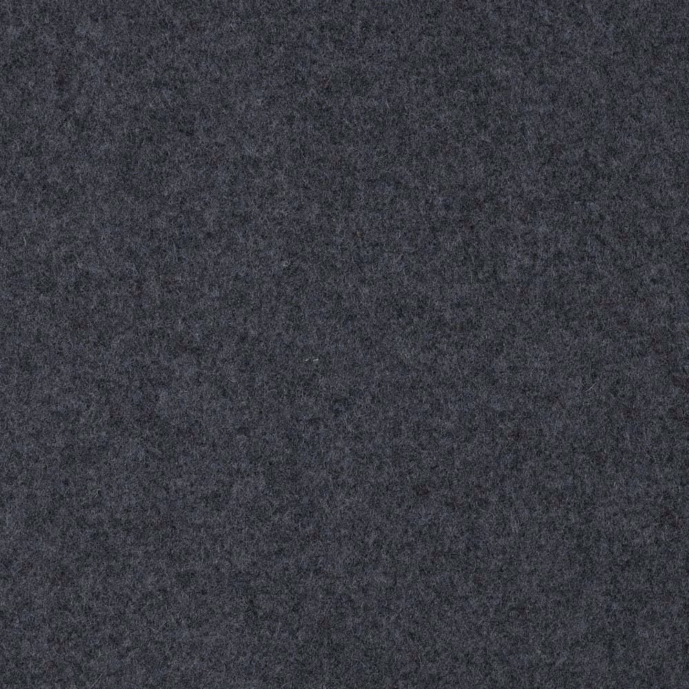 Close-up of deep blue-charcoal fabric with a dense, softly mottled texture