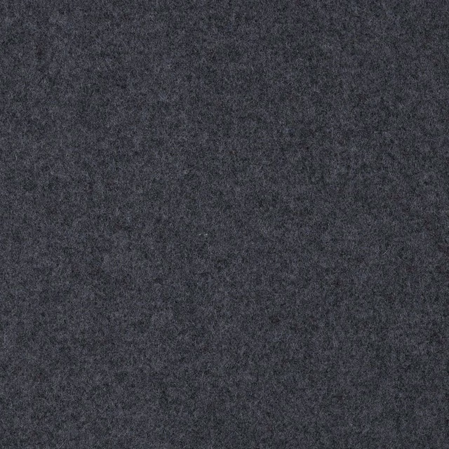 Close-up of deep blue-charcoal fabric with a dense, softly mottled texture